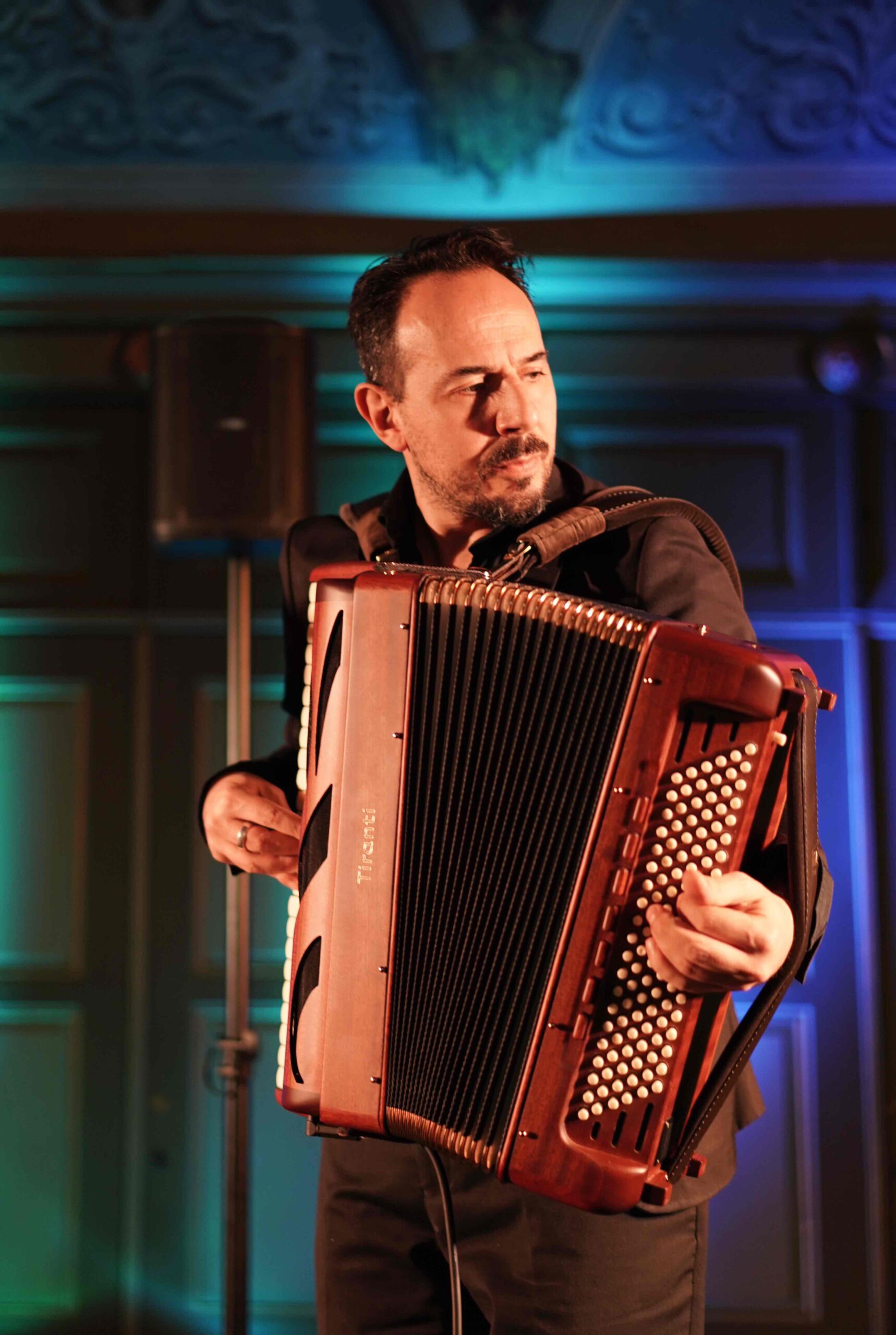 Studio Photos Roberto Palermo studio portrait with accordion