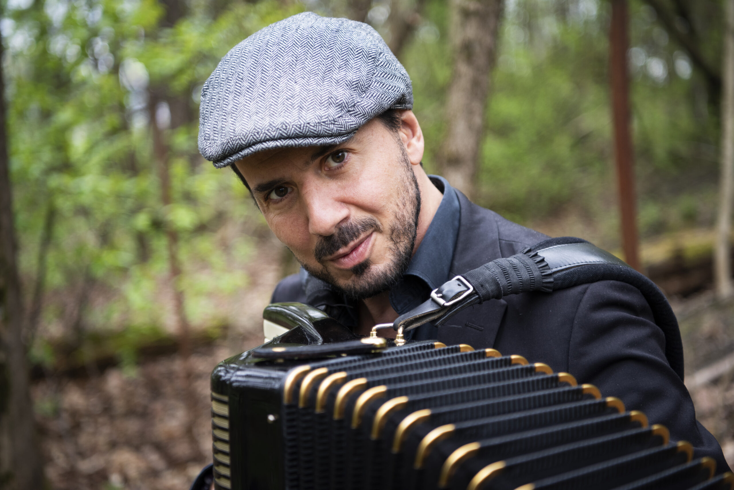 Roberto Palermo studio portrait with accordion